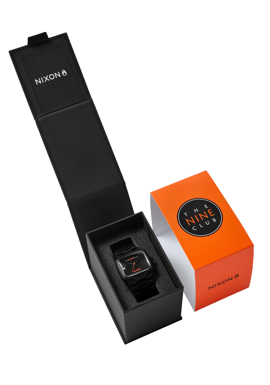 A white box with a clear window displays a product, possibly a small electronic device, with "A1403-004" printed on the packaging.