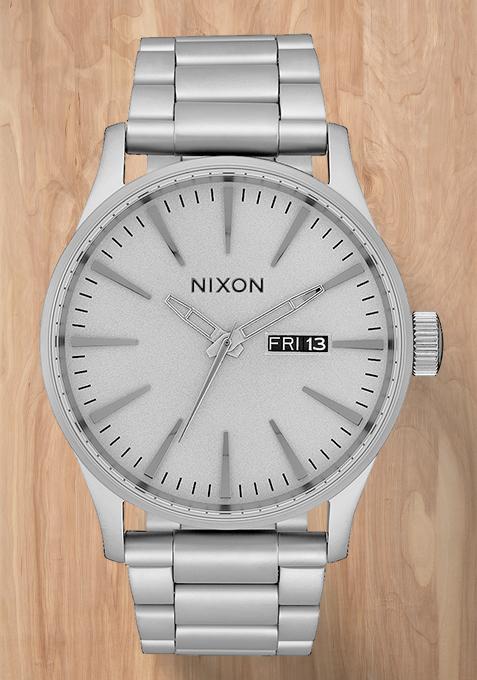 A silver Nixon Sentry that is not yet customized.