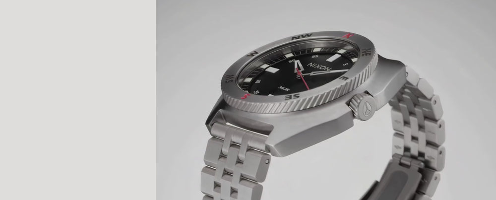 mp4 takedown of nixon logo, showing pendulum, flames, and nixon watches.